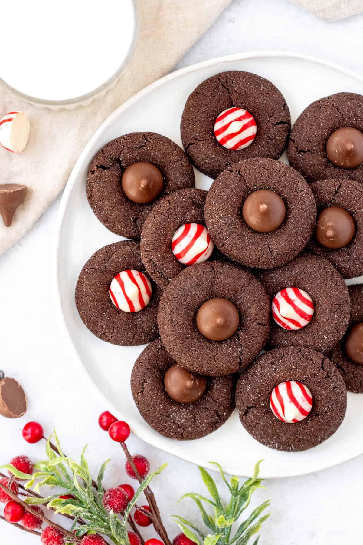 Plate of Hershey's Kiss cookies, with glass of milk