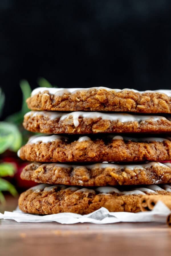 Stack of gingerbread oatmeal cookies with vanilla icing