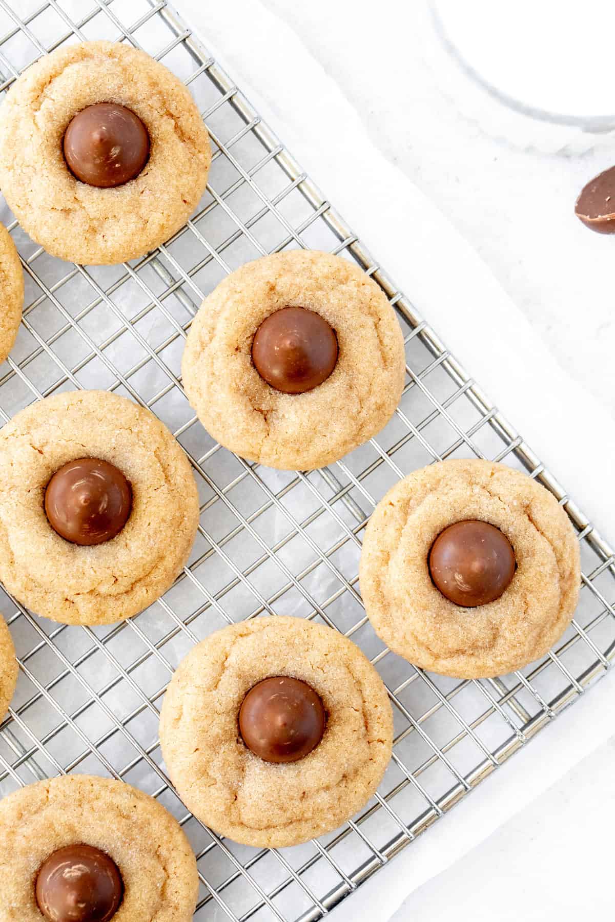 Peanut butter blossoms on a cooling rack