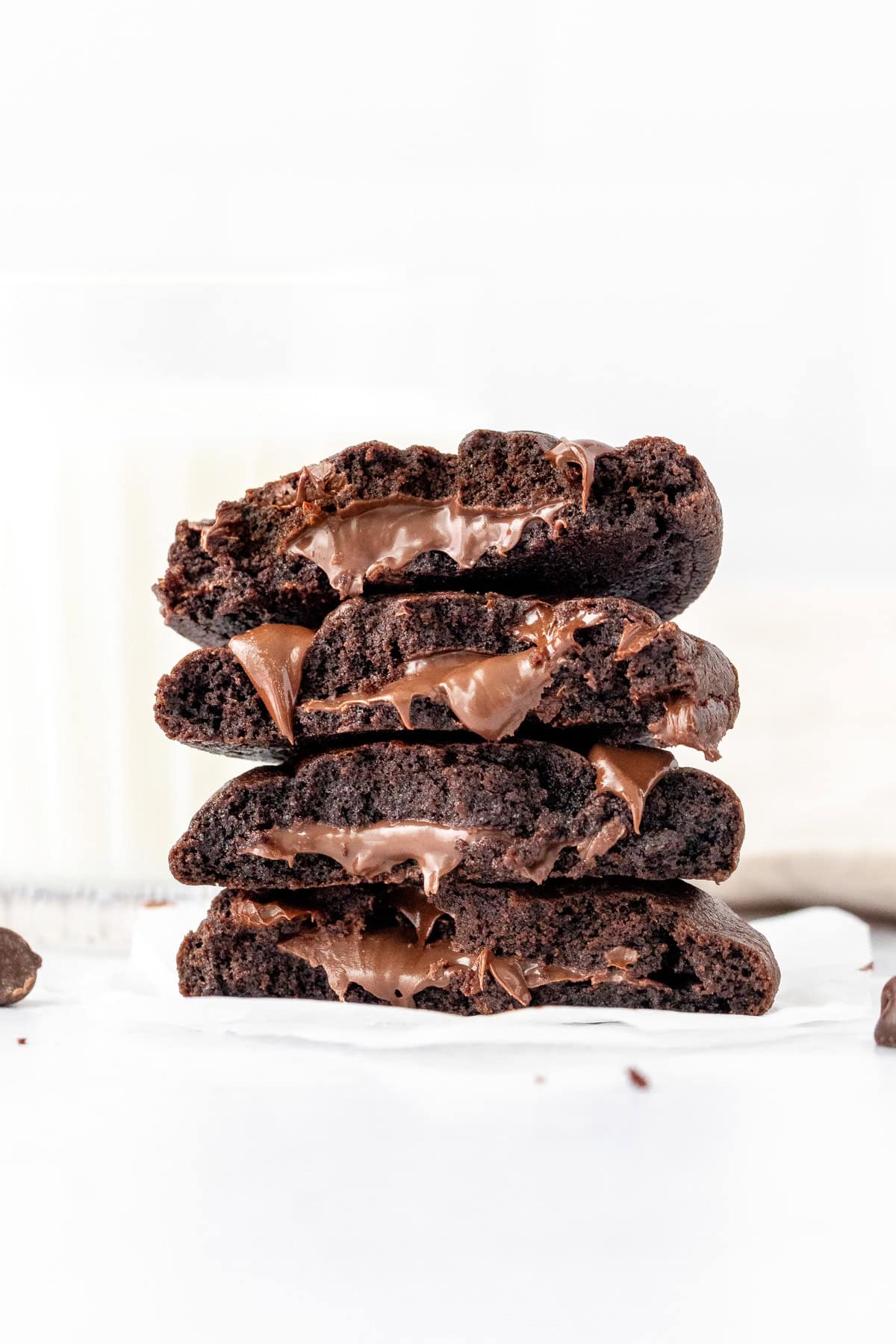 Stack of thick chocolate cookies, with Nutella in the middle of each cookie