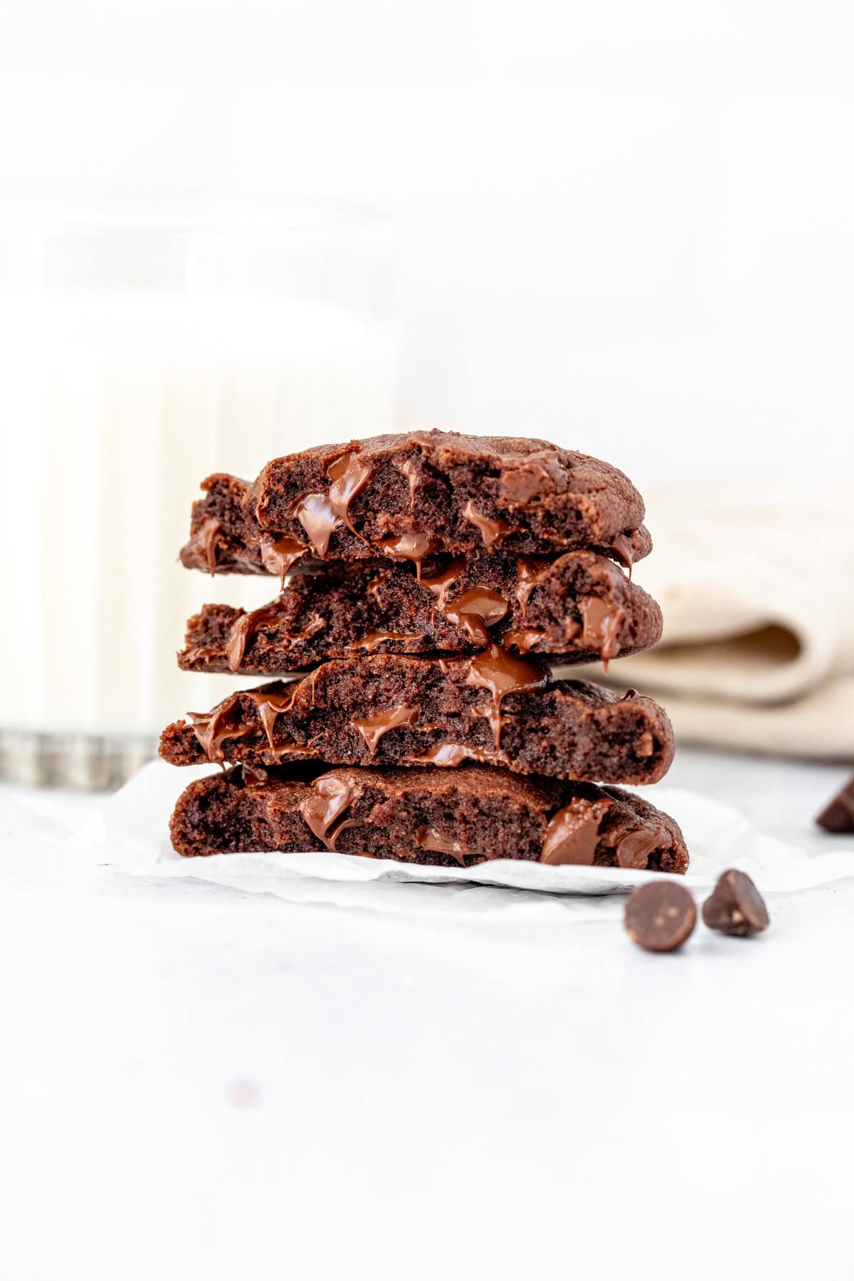 chocolate cookies broken in half and stacked on top of one another