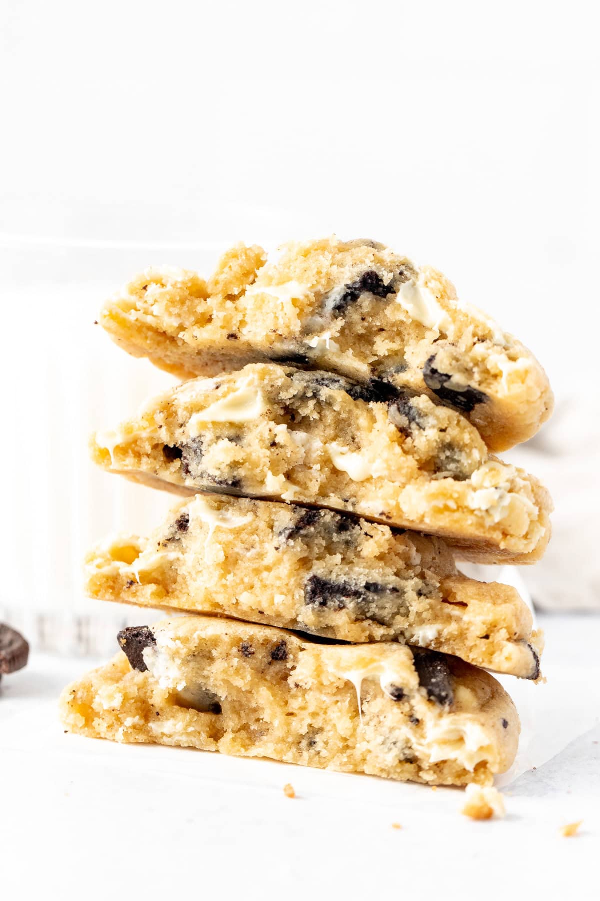 Cookies n' cream cookies, broken in half and stacked on top of one another