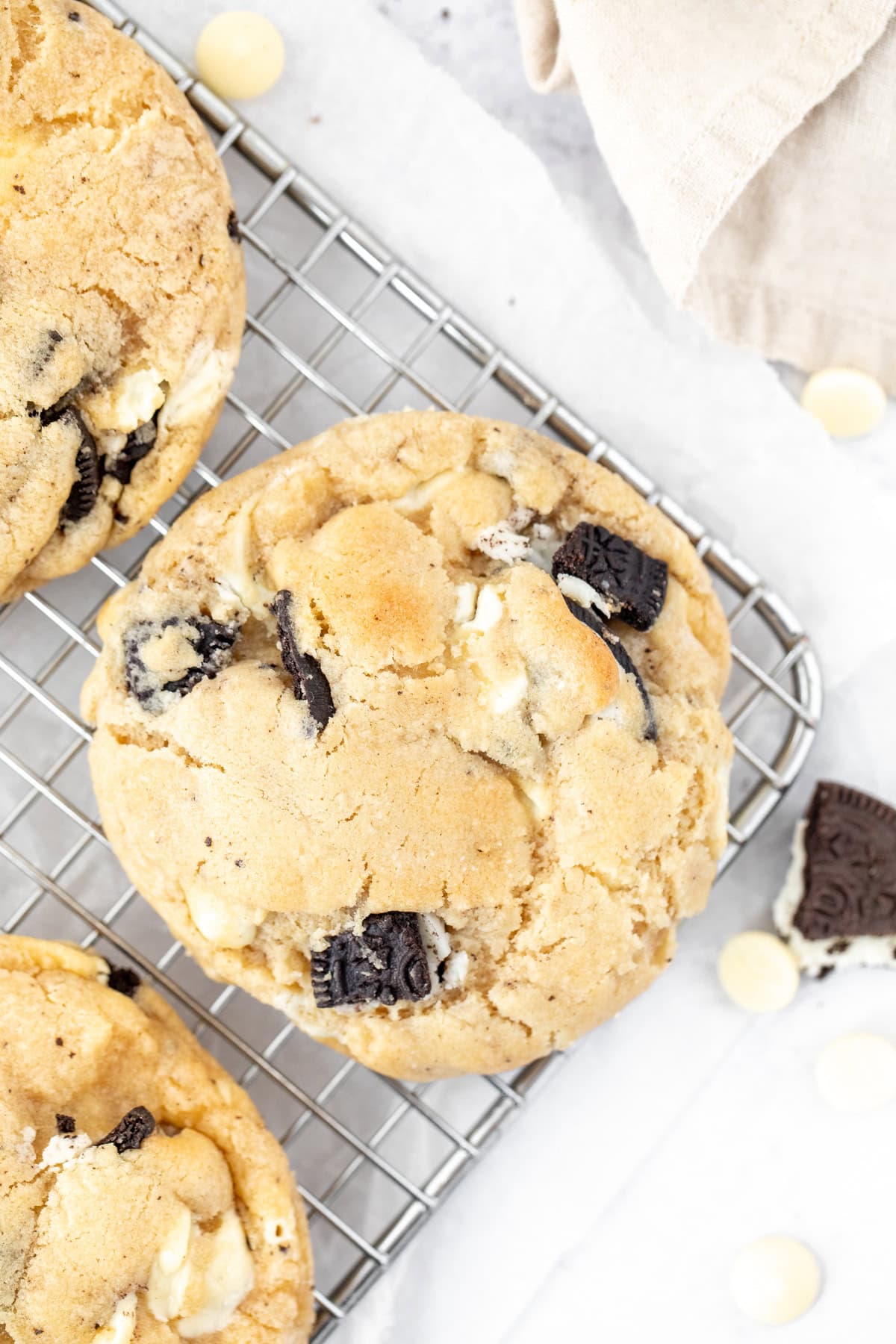 Bakery style cookies and cream cookies, on a cooling rack