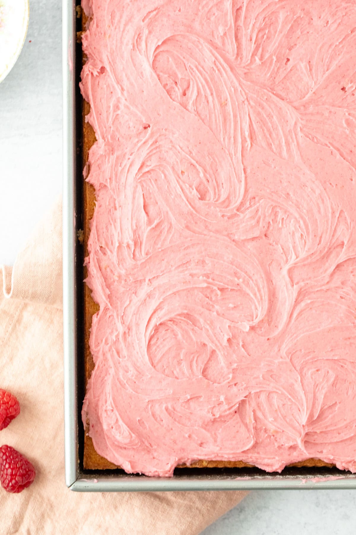 Sheet cake with pink raspberry frosting
