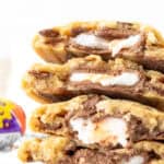 stack of cookies stuffed with Cream Eggs, broken in half
