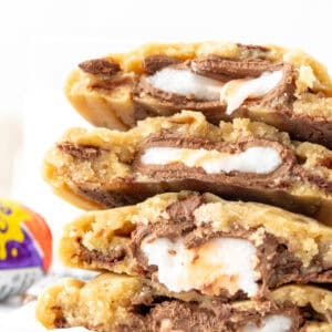 stack of cookies stuffed with Cream Eggs, broken in half