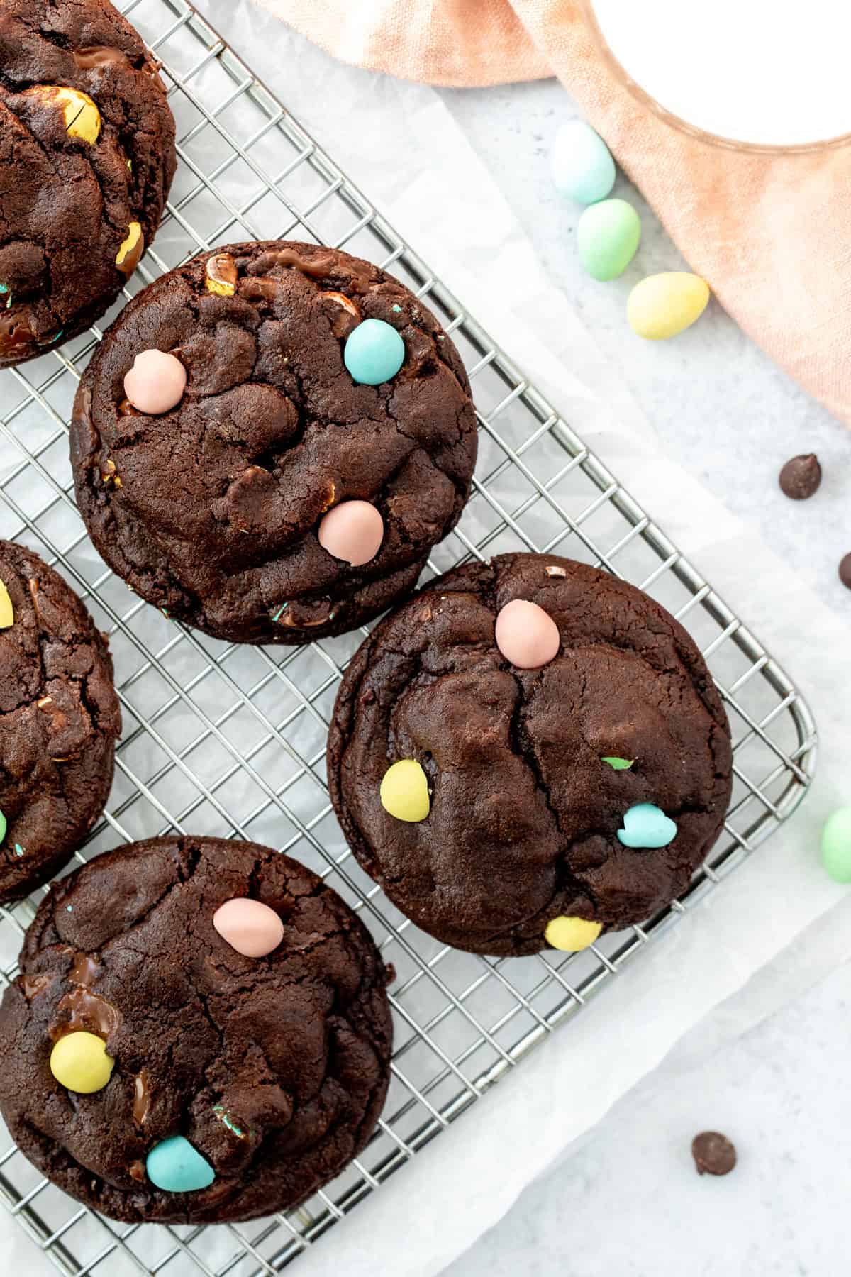 Mini Egg chocolate cookies on a cooling rack