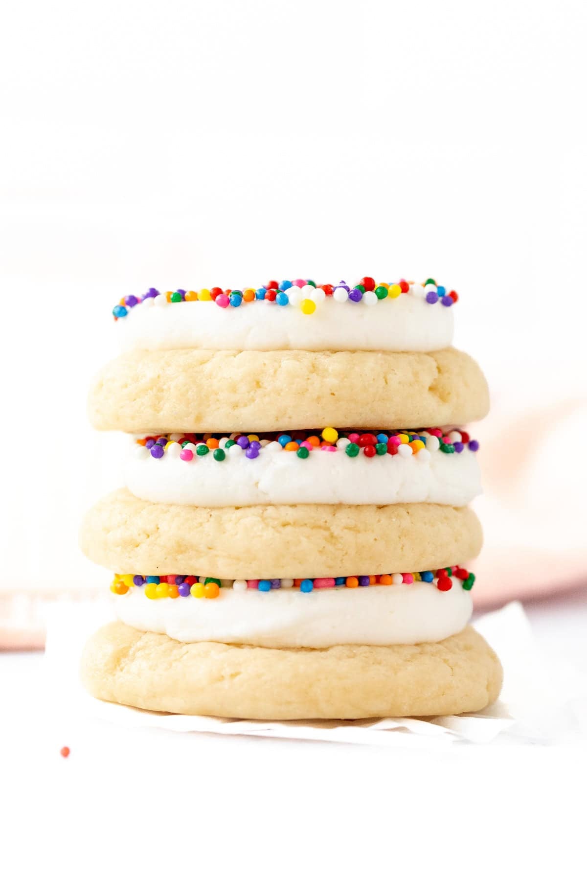 Three dot cake cookies, stacked on top of one another