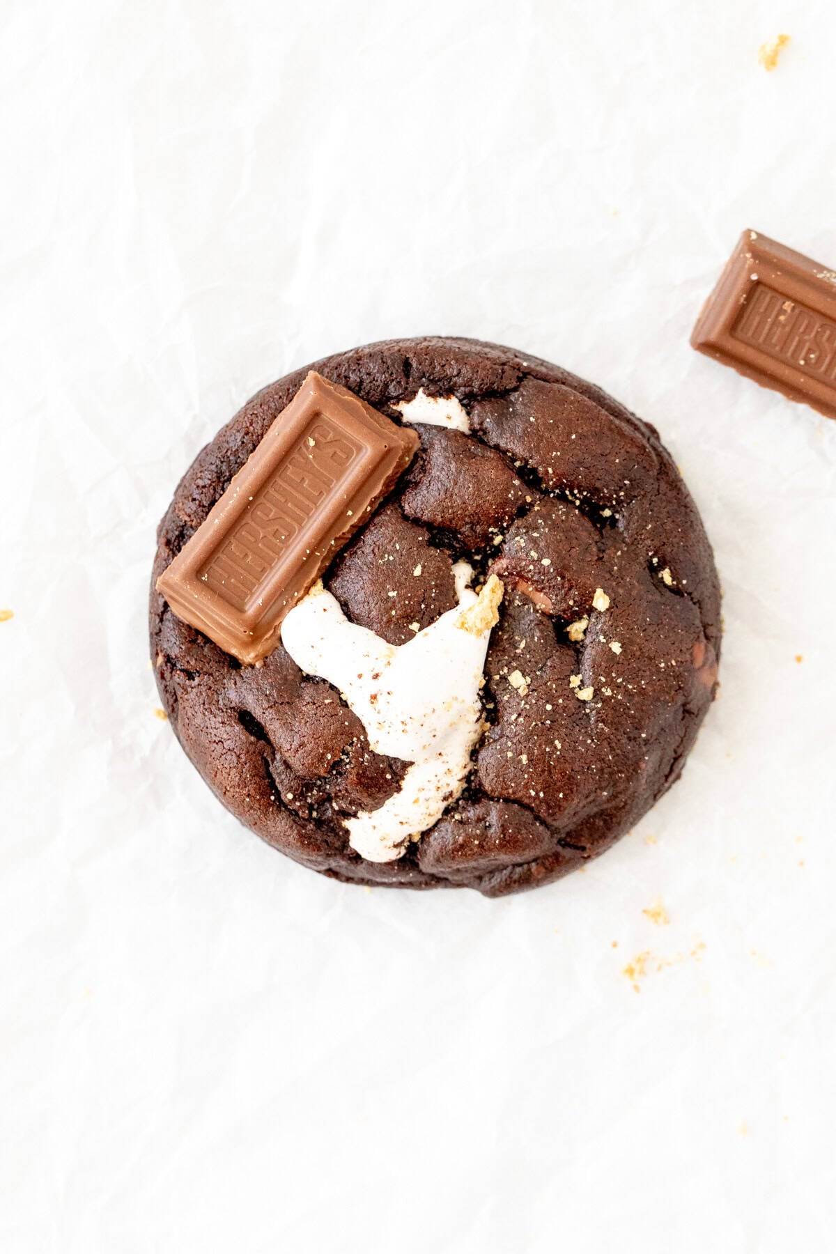 chocolate s'more cookie topped with Hershey's milk chocolate and graham crumbs