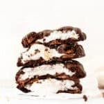 Stack of chocolate s'mores cookies, broken in half