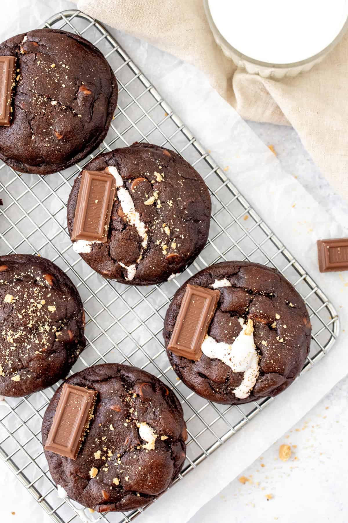 s'mores chocolate cookies on a wire cooling rack