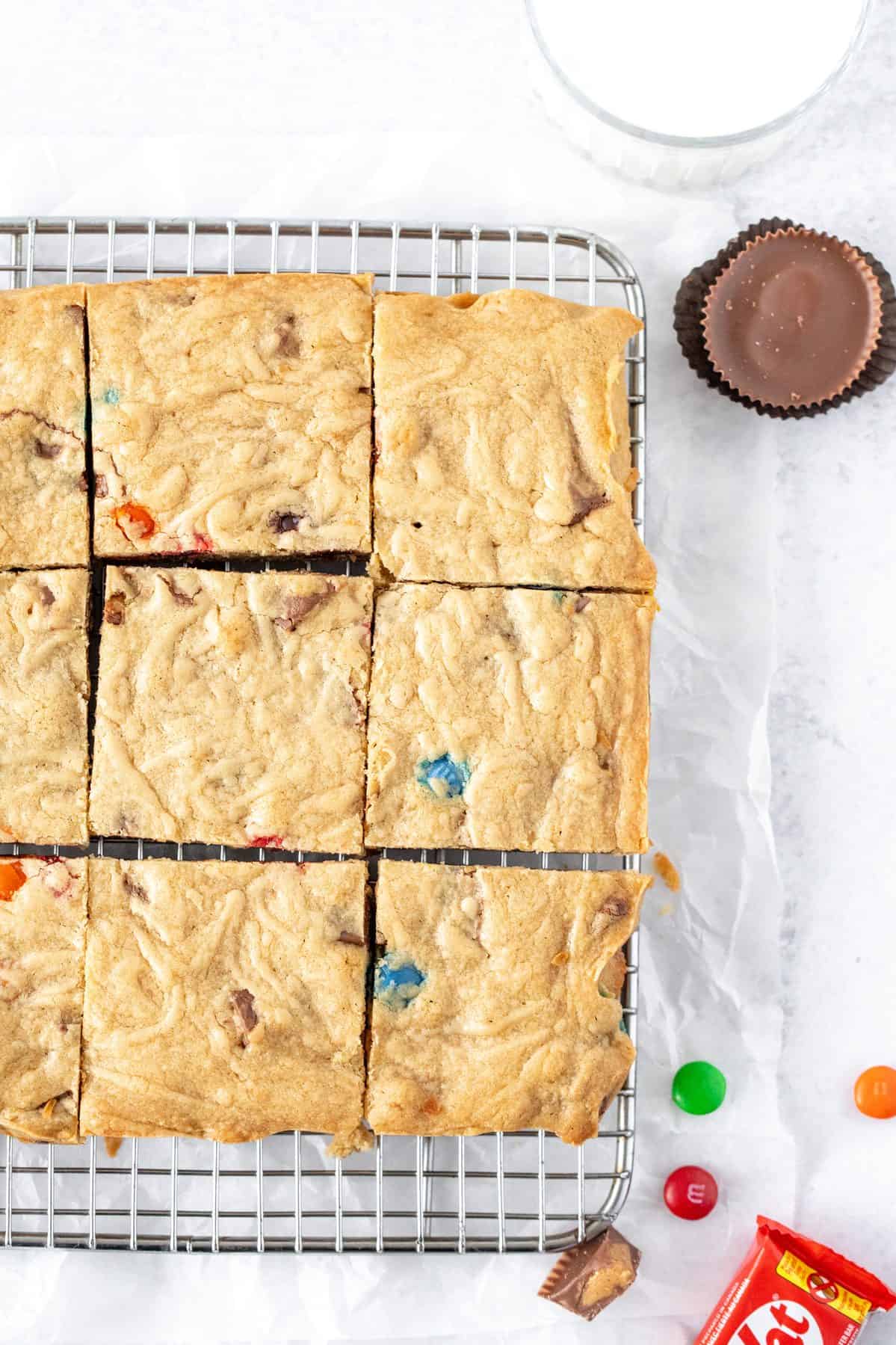 candy bar blondies on a cooling rack