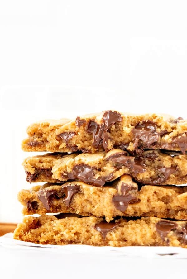 Stack of fall-spice chocolate chip cookies, broken in half